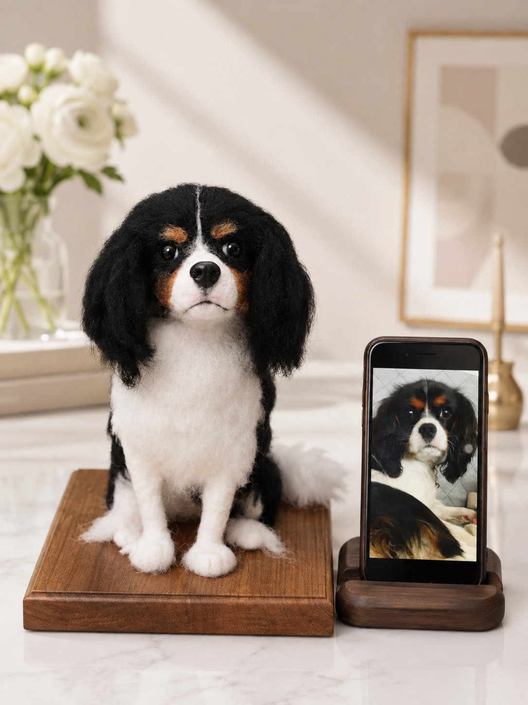 Custom full-body wool spaniel figurine beside its reference photo