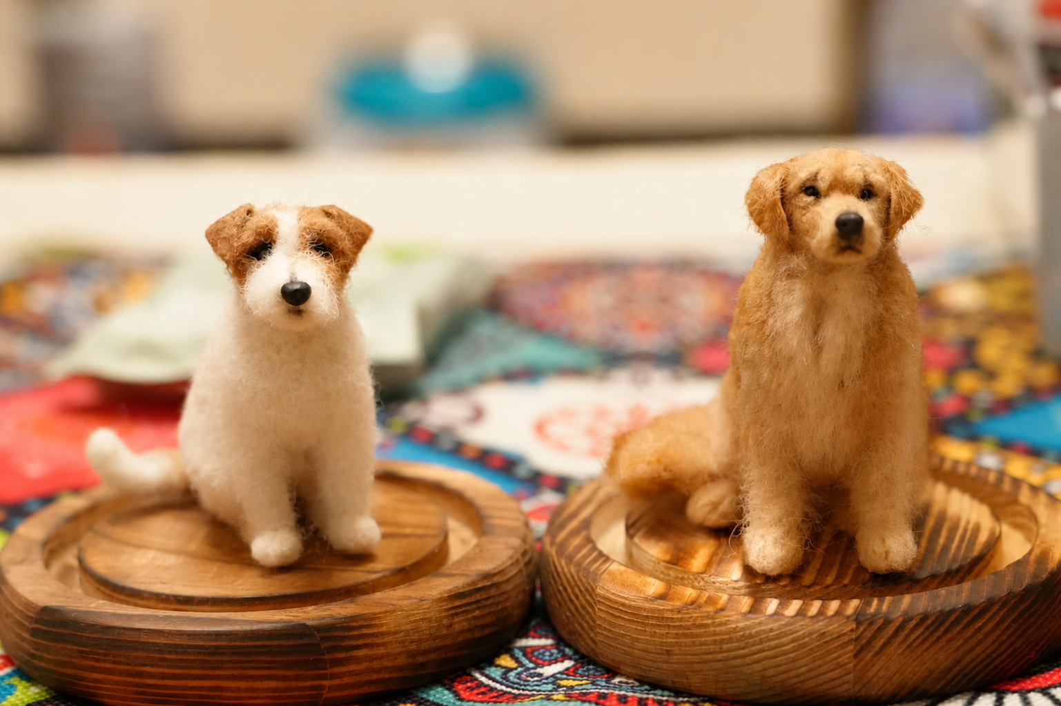 Two handcrafted miniature wool dog figurines by Pawloom Studio