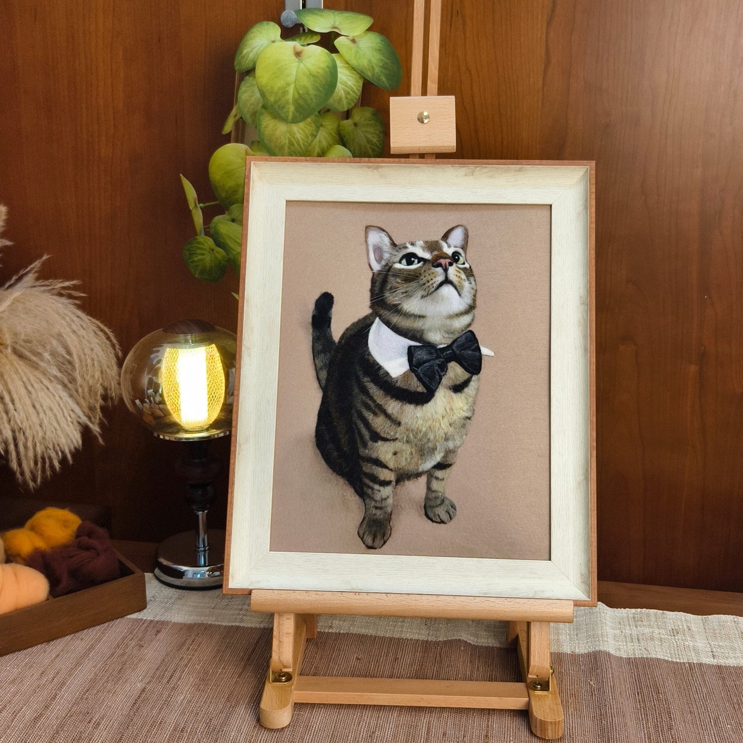 Wool-painted tabby cat portrait with a bow tie