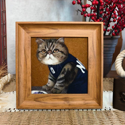 Handcrafted wool-painted tabby cat portrait in a wooden frame
